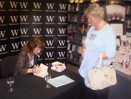 Janet signing books